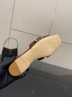 YSL pink mule outsole view, beige sole underside of open-toe slide shoe