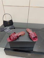 YSL patent pink bow mules, open toe slide sandals with layered bow straps on box