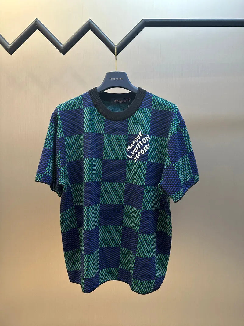 Blue and green check short-sleeve top with white graphic logo