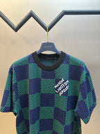 Louis Vuitton crew-neck T-shirt, blue and green checked knit, short sleeves, chest text graphic.