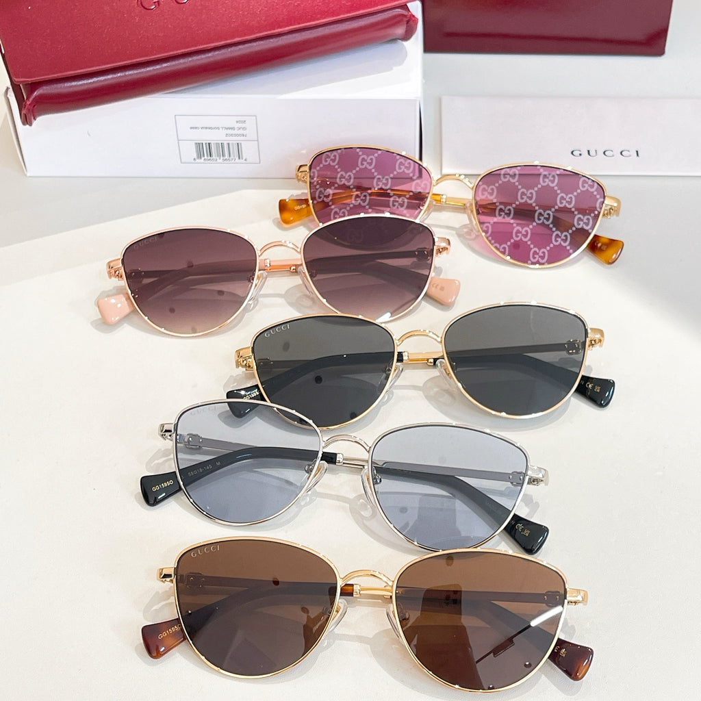 Sunglasses assortment with purple, brown, and dark lenses in gold frames.