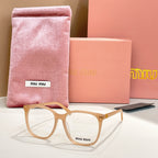 MiuMiu eyeglasses with tan frame and clear lenses, with pink storage pouch