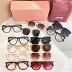 Assorted sunglasses and eyeglasses with pink case and pouch