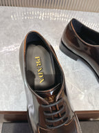 Prada lace-up leather shoe with PRADA logo on inner lining, dark brown upper