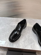 Prada unisex lace-up dress shoes, glossy black leather, stitched lace panel.