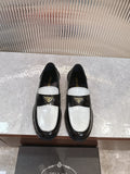 Prada unisex loafers, black leather with white saddle panel and gold logo