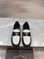 Prada unisex loafers, black leather with white saddle panel and gold logo