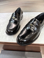 Prada unisex loafers, black leather with seam detailing and polished shine