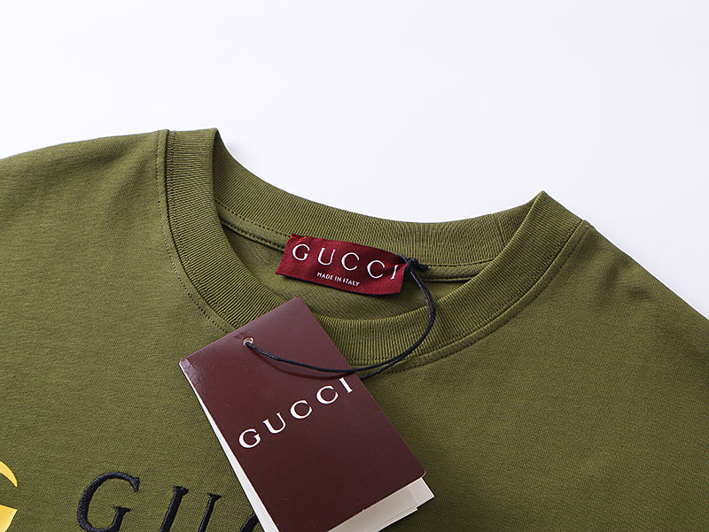 Olive Gucci T-shirt neckline with red Gucci neck label