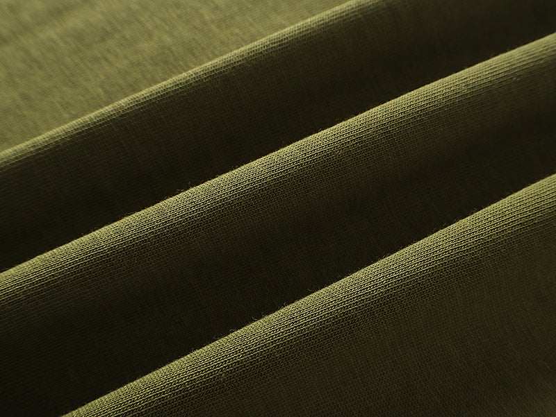 Olive T-shirt fabric texture close-up