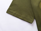 Olive T-shirt sleeve hem with neat stitching detail