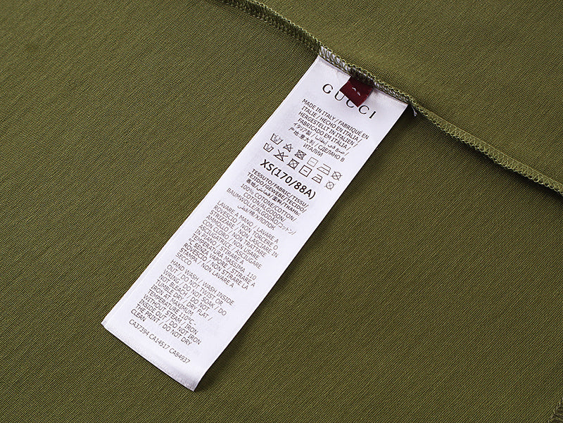 Olive T-shirt inside neck label and size tag