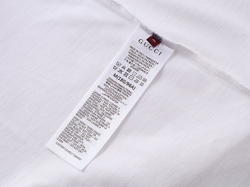 White T-shirt with size and care labels at inner neck