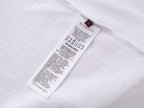 White T-shirt with size and care labels at inner neck