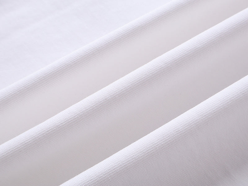 White T-shirt fabric close-up with fine knit texture