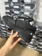 Black leather Amiri sneakers with thick sole and lace-up front