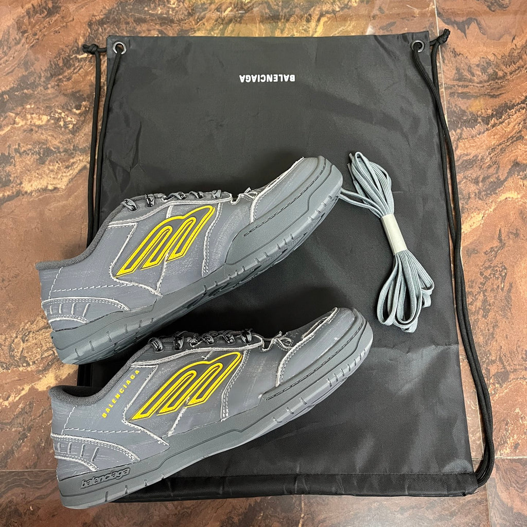 Balenciaga unisex low-top sneakers, light gray with yellow logo and laces