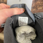 Grey sneaker interior label showing Balenciaga sizing and Made in China text.