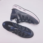 Moncler low-top sneakers in dark blue, top and toe views with white sole