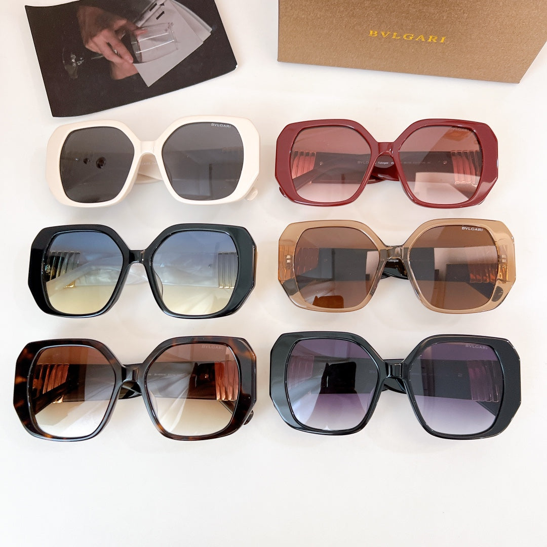 Bvlgari sunglasses set with multiple frames: red, white, black, gold and dark