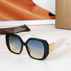 Bvlgari sunglasses with dark frames and blue tinted lenses