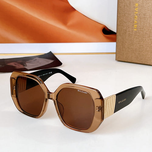 Bvlgari sunglasses with gold-tone frames and tinted brown lenses