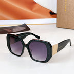 Bvlgari sunglasses with black frames and tinted purple lenses