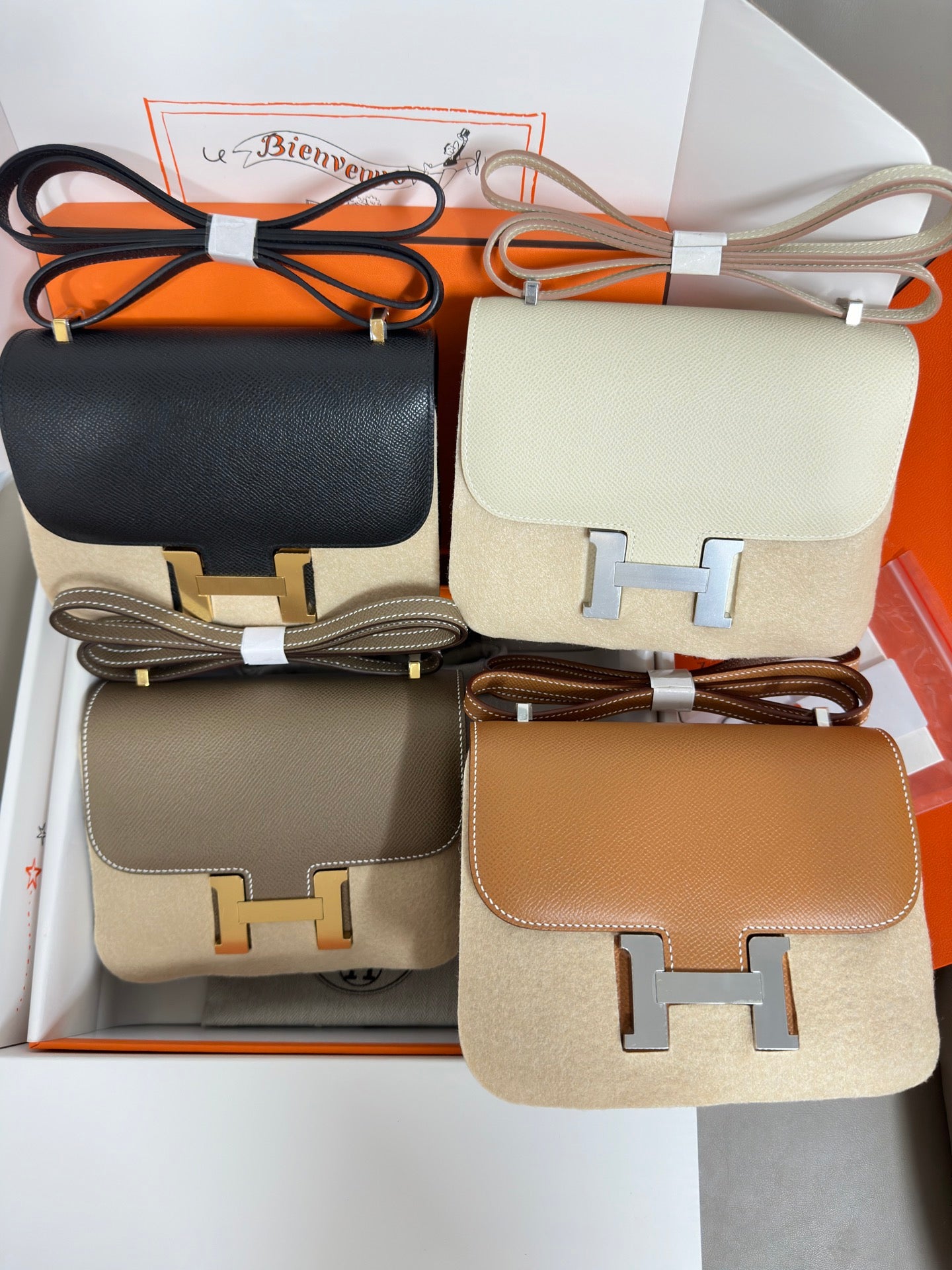 Hermes crossbody bags set with black, cream, taupe, and tan flap bags and H hardware
