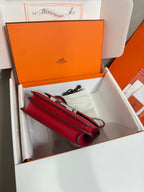 Hermes red leather bag with long strap