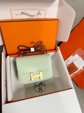 Mint green leather flap bag with gold H clasp and shoulder strap