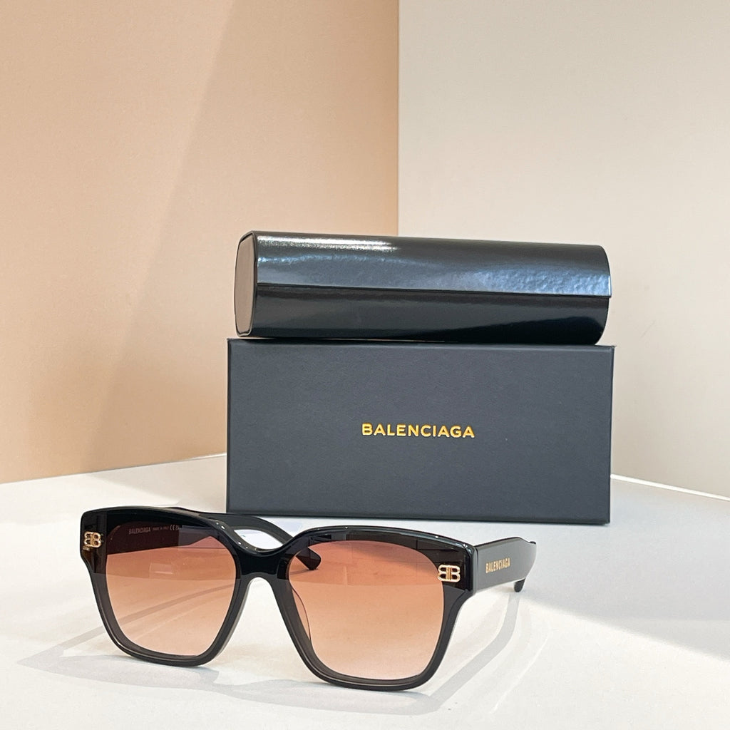 Square sunglasses with black frames and orange-brown lenses