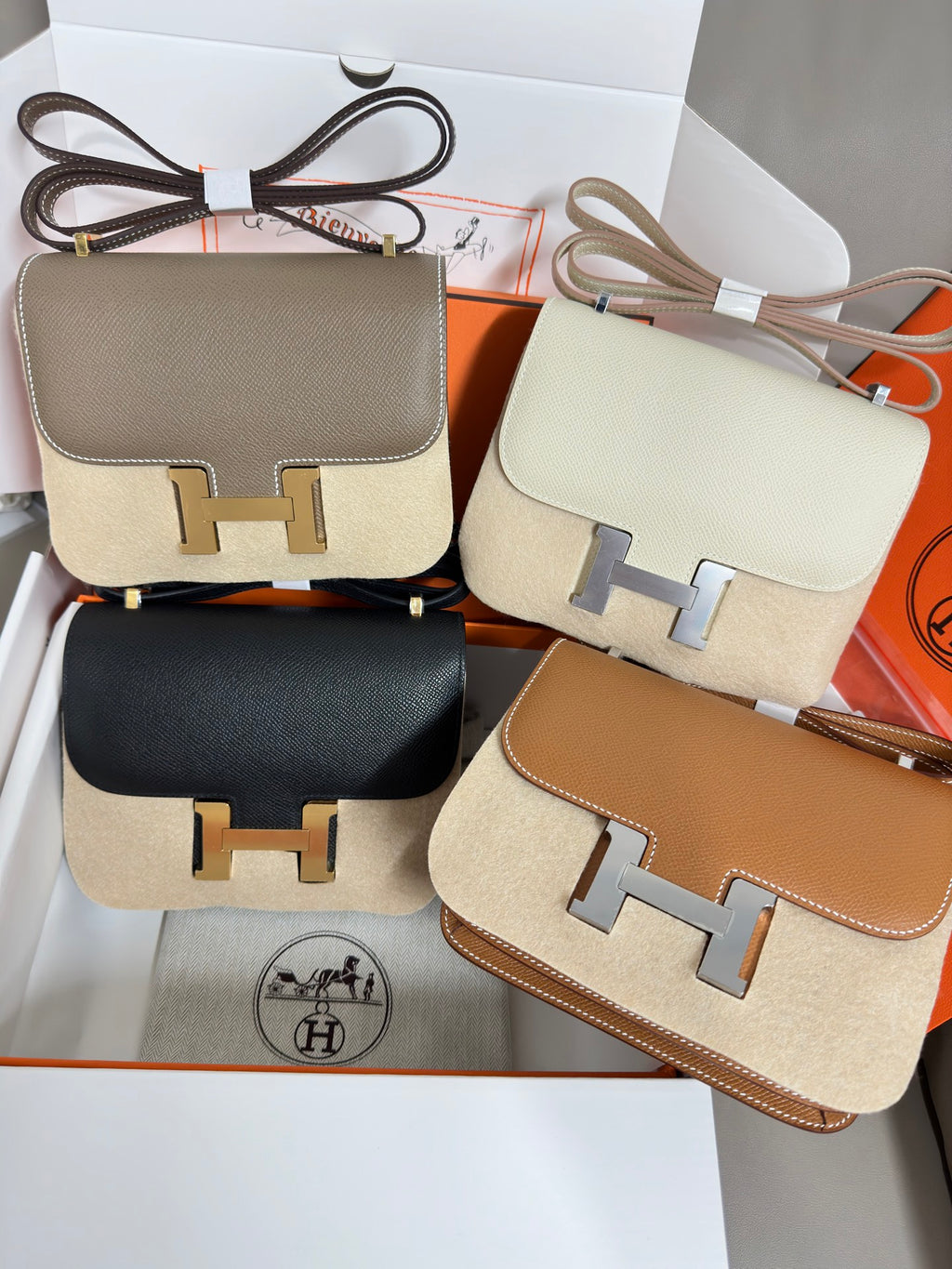 Hermes crossbody bags set showing taupe, cream, black, and tan with H logo clasps