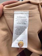 Long-sleeve shirt interior with Burberry fabric care label and buttons
