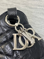 Dior black quilted leather bag with silver-tone Dior charm and ring hardware