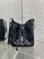 Dior black quilted leather crossbody bag with drawstring-style top closure