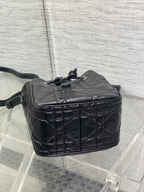 Dior black quilted leather crossbody bag with back panel and drawstring pull