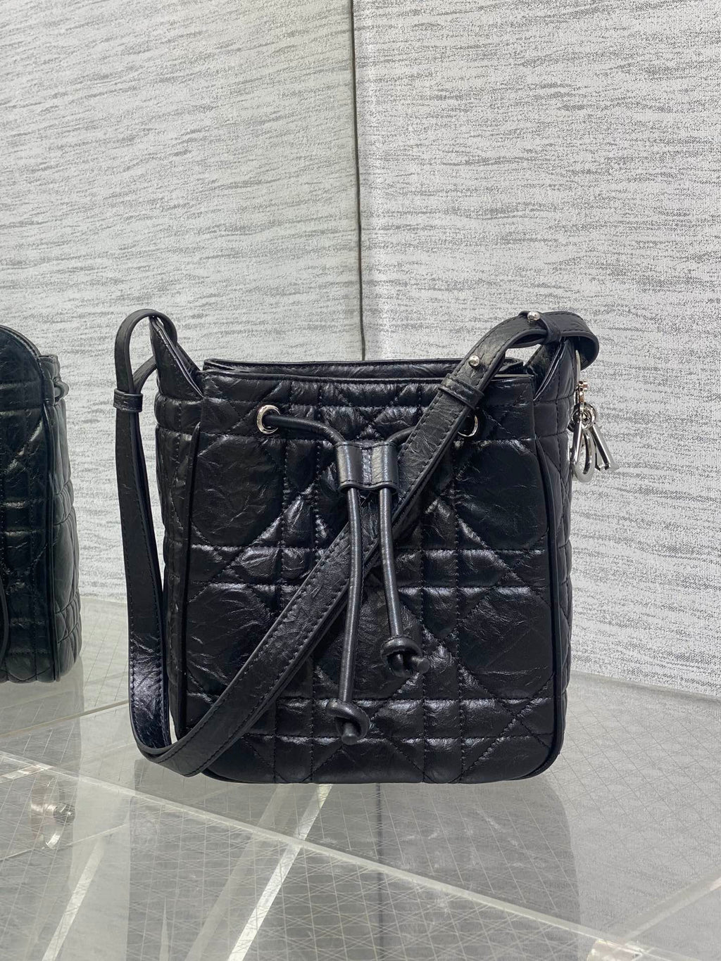 Dior black quilted leather crossbody bag with shoulder strap and top zip
