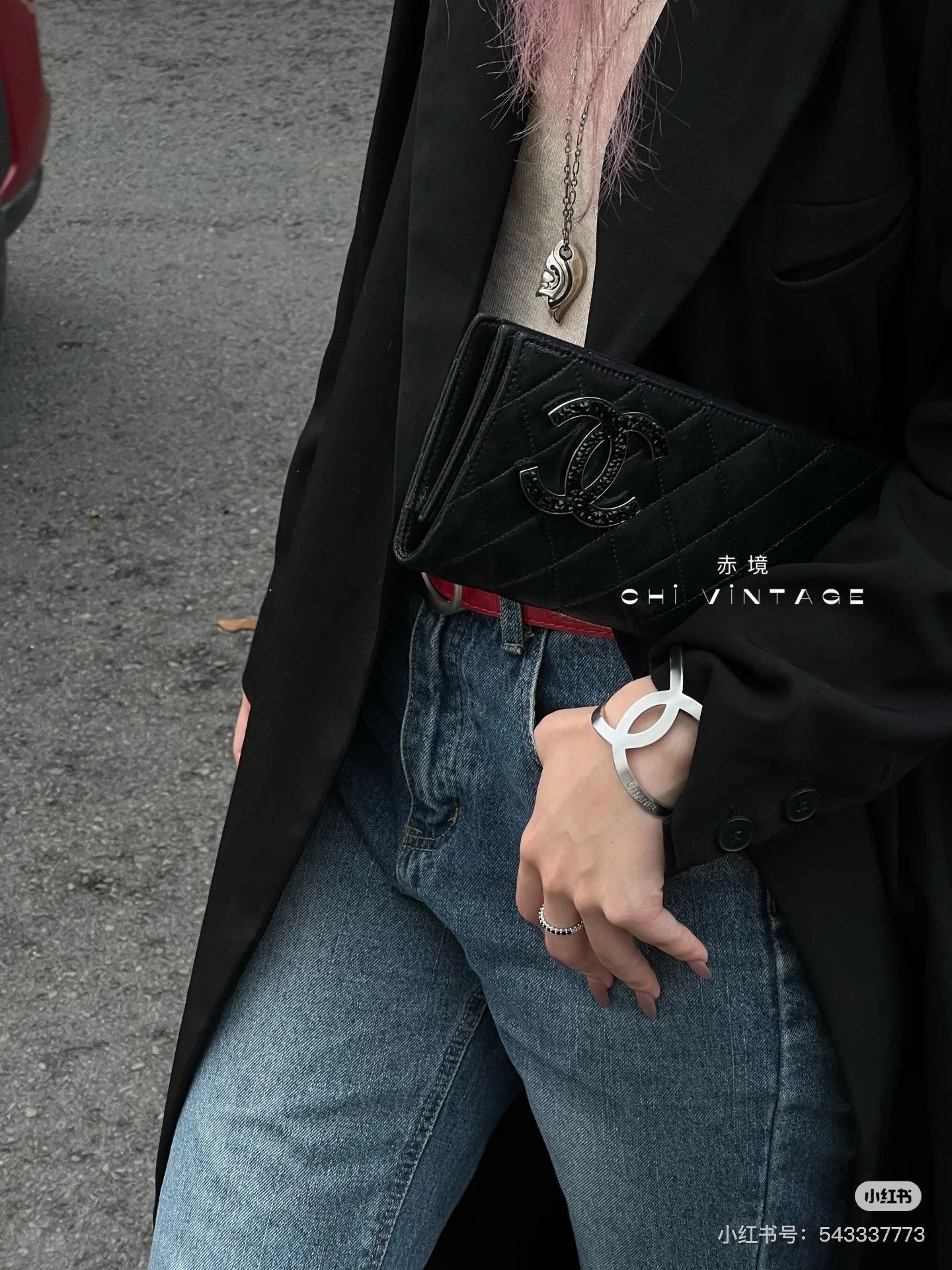 Chanel black quilted clutch with CC clasp and silver-tone CC cuff bracelet