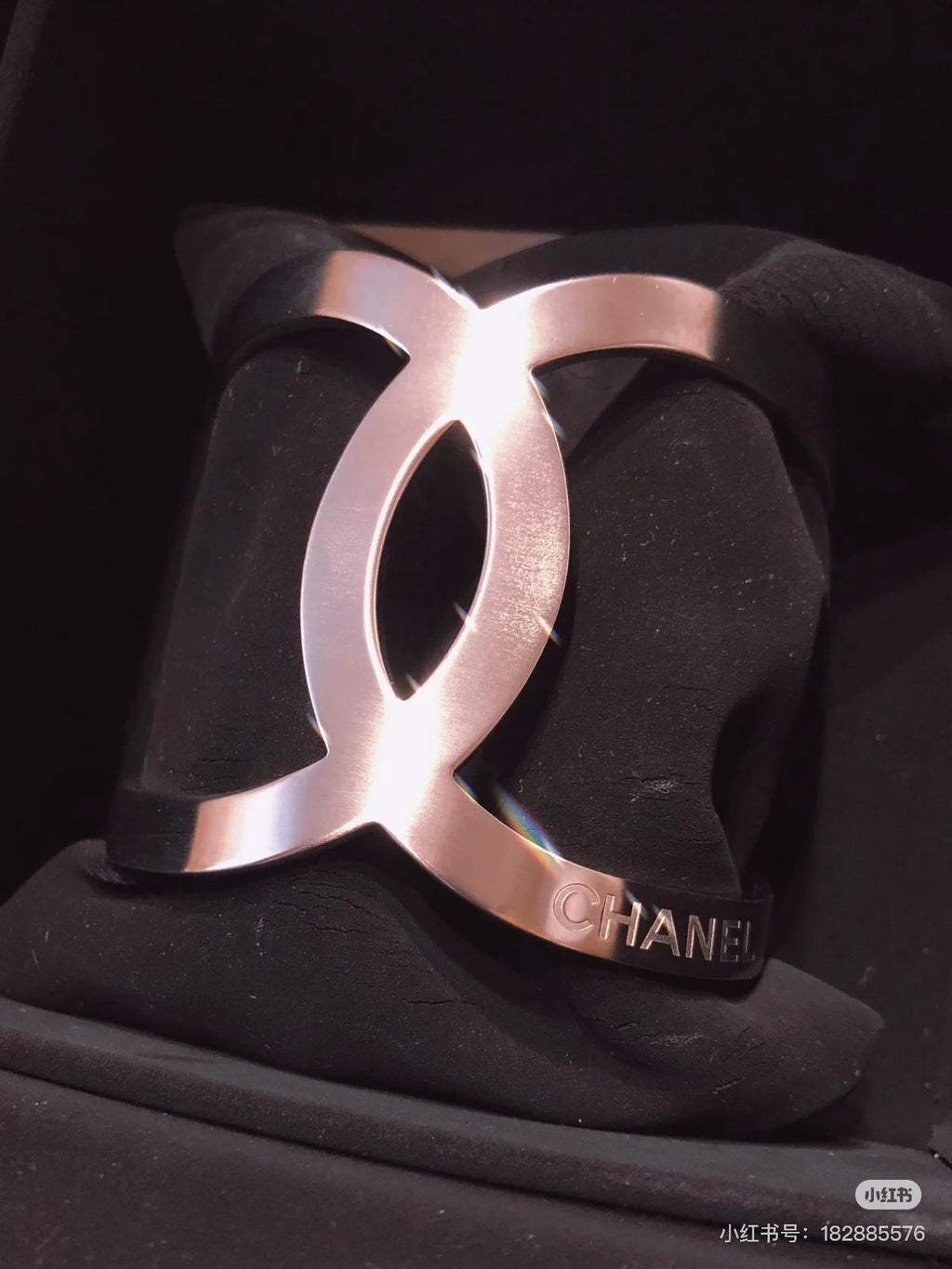 Chanel silver-tone CC cuff bracelet with wide hinged design