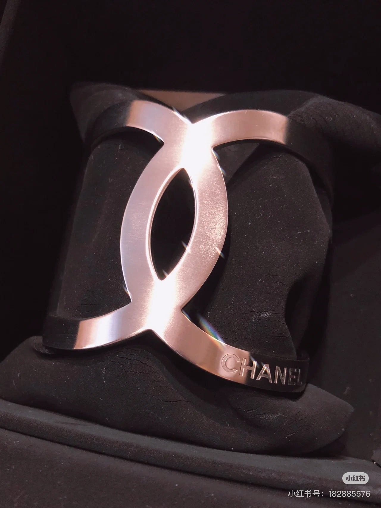 Chanel silver-tone CC cuff bracelet with wide hinged design
