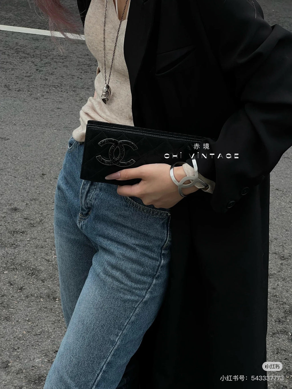 Chanel black quilted clutch bag with CC logo