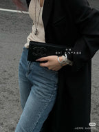 Chanel black quilted clutch bag with CC logo