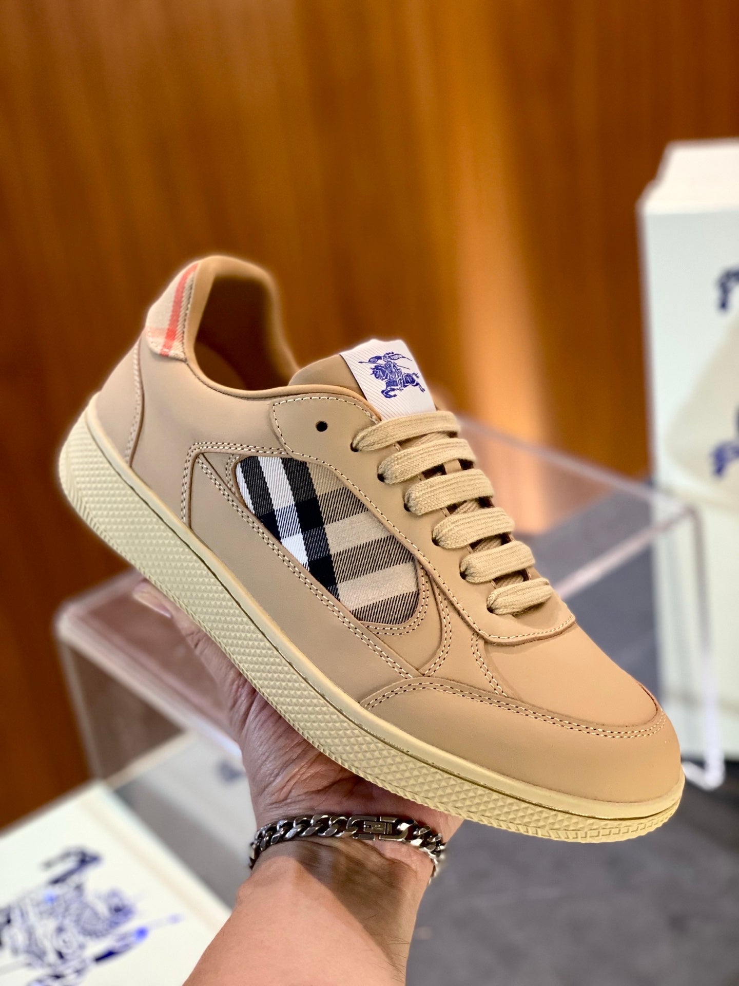 Light beige suede low-top sneakers with check stripe and lace-up closure
