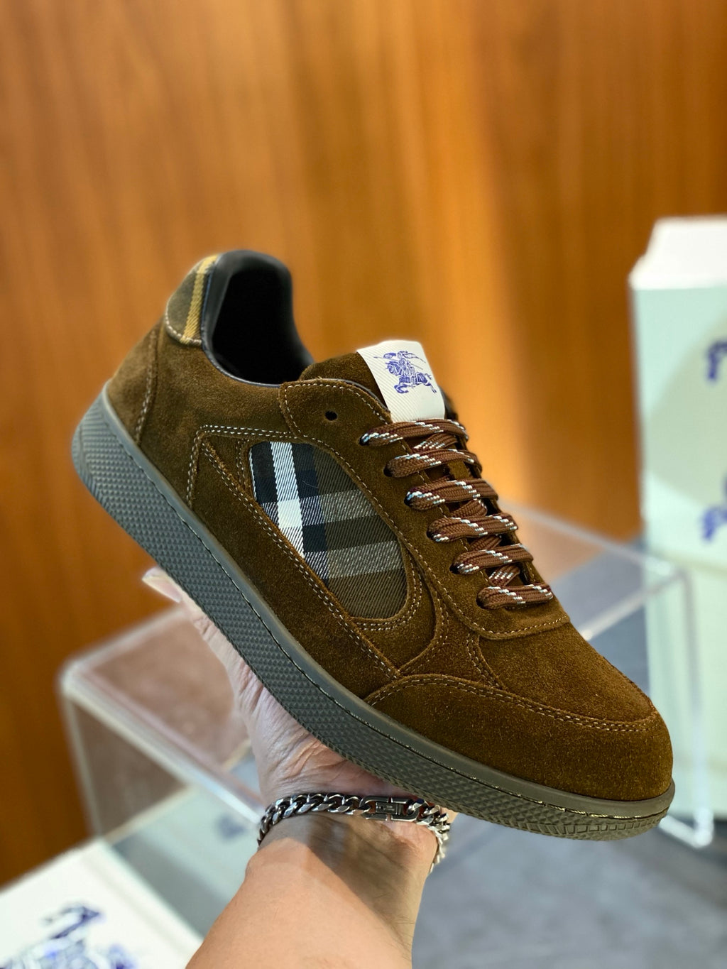 Brown suede sneakers with side check stripe, lace-up closure and padded collar