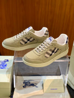 Cream leather low-top sneaker with Burberry plaid panel and blue horse logo heel tab