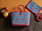 Denim tote bag with cherry motif, red handles and matching zip pouch