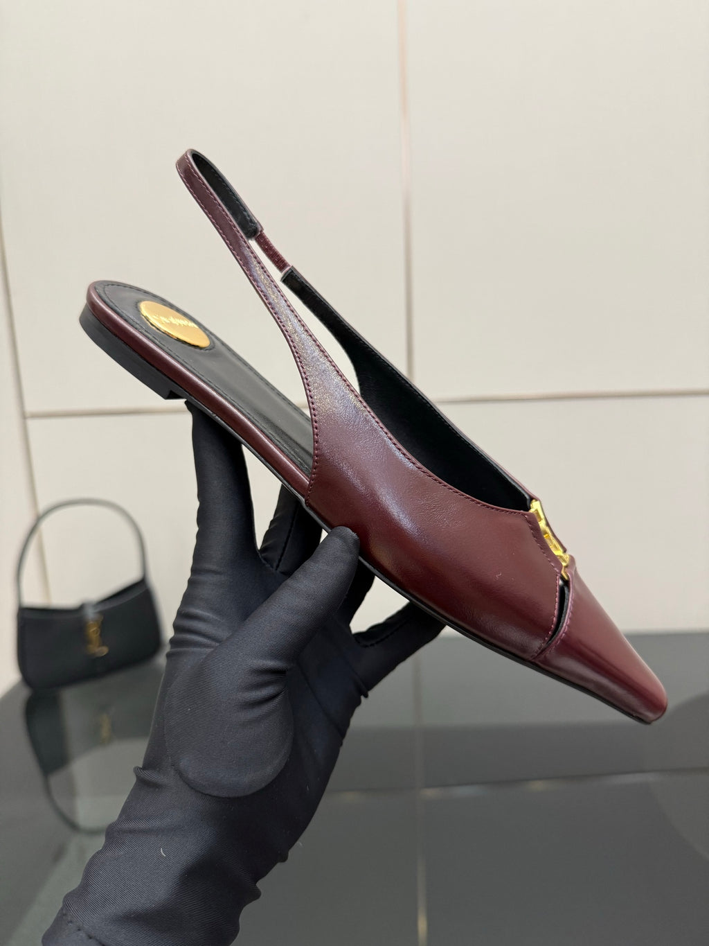 Women's YSL slingback flats in burgundy, pointed toe and low heel, gold hardware