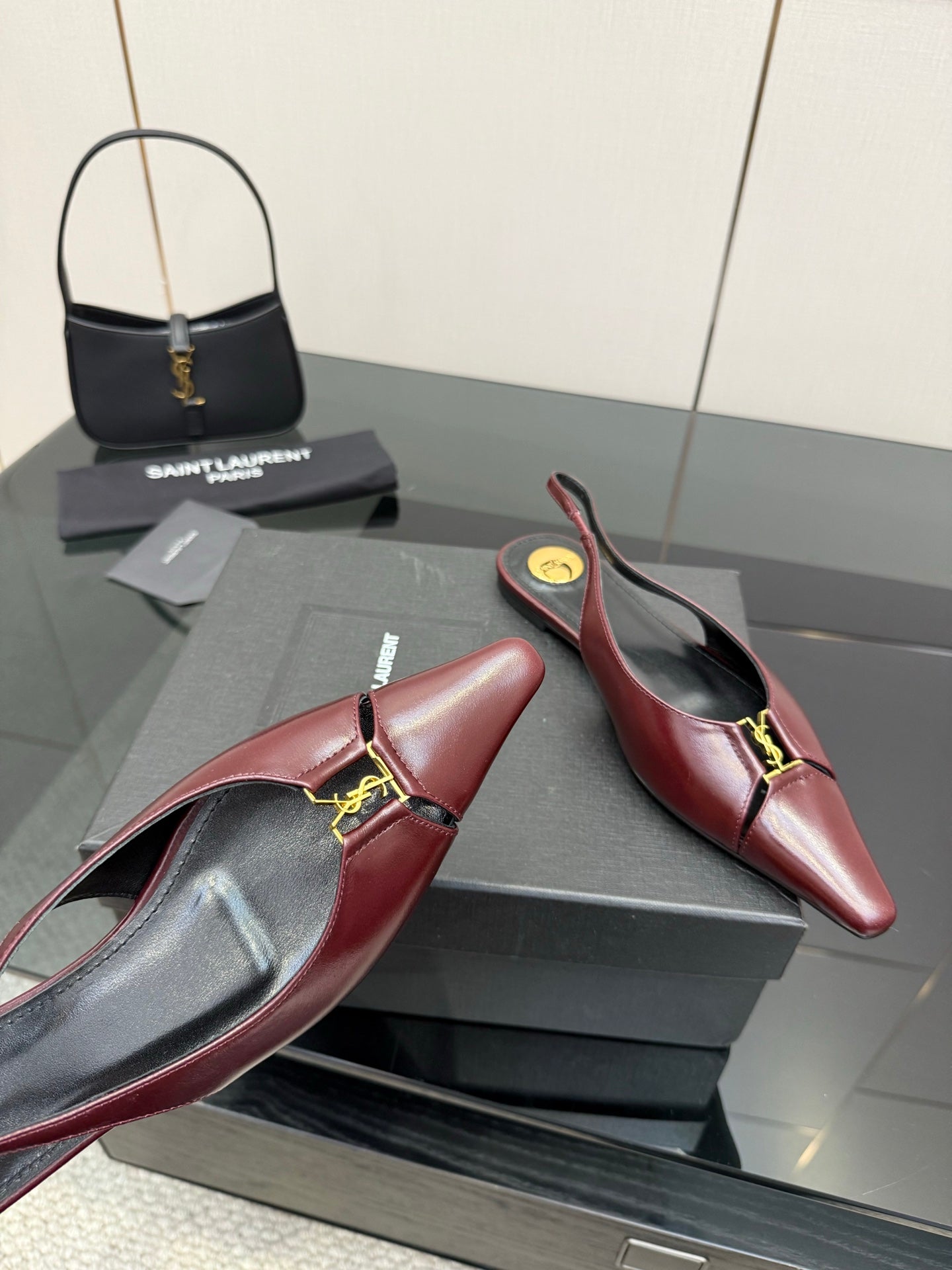 Women's YSL slingback flats, burgundy pointed toe with gold hardware and sling
