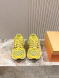 Dior unisex low-top sneakers in bright yellow with mesh panels and lace-up design