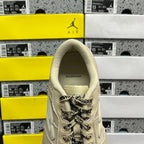 Beige Balenciaga sneaker with BALENCIAGA text on heel and lace-up upper